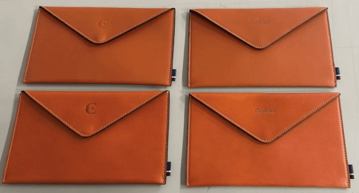 TAME THE RECEIPT CHAOS: SECURE YOUR RECEIPTS WITH A LEATHER RECEIPT HOLDER.